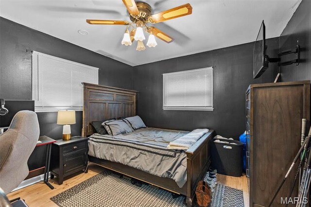 804 Harvard St, Sikeston, MO 63801 - bedroom with light wood-type flooring and a ceiling fan