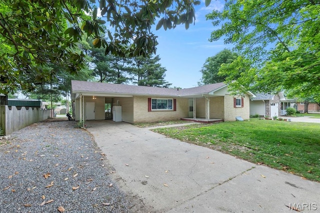 804 Harvard St, Sikeston, MO 63801 - ranch-style home featuring driveway, a carport, and brick siding