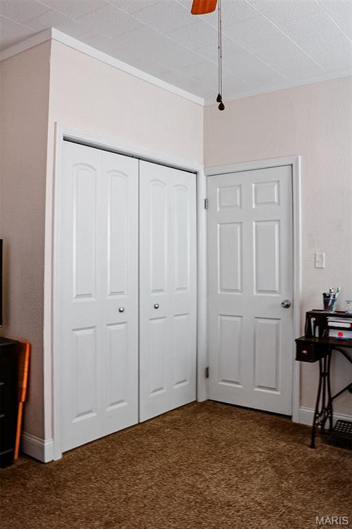 205 Watts St, Park Hills, MO 63601 - carpeted bedroom with crown molding, a closet, a ceiling fan, and baseboards