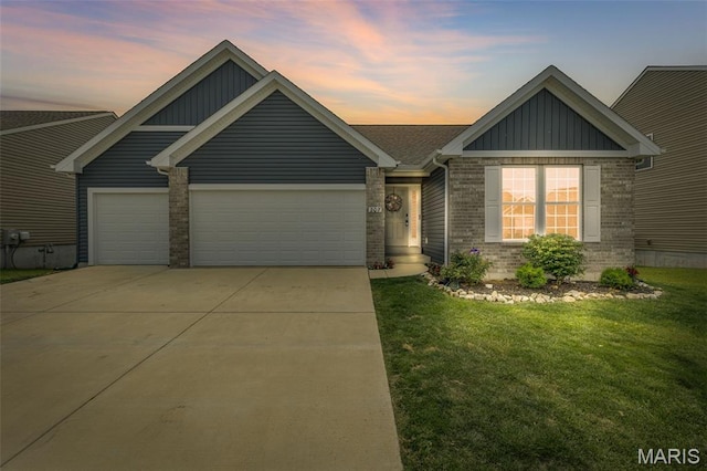 207 Savannah Ridge Ct, Fenton, MO 63026 - view of front of house with board and batten siding, an attached garage, brick siding, a front yard, and driveway