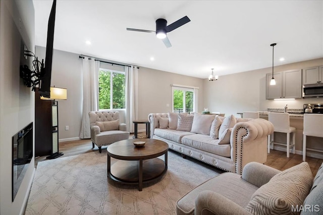 719 Myatt Dr, Wentzville, MO 63385 - living room featuring light wood-style flooring, recessed lighting, and ceiling fan