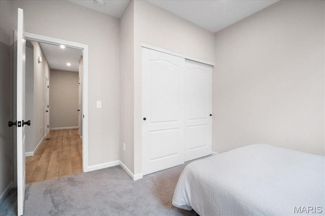 719 Myatt Dr, Wentzville, MO 63385 - bedroom with carpet, a closet, and recessed lighting