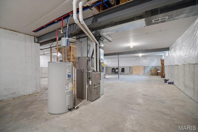 719 Myatt Dr, Wentzville, MO 63385 - unfinished basement featuring electric water heater and heating unit