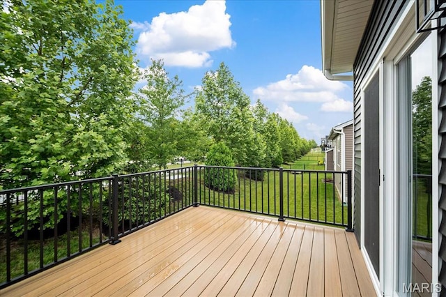 719 Myatt Dr, Wentzville, MO 63385 - deck featuring a lawn