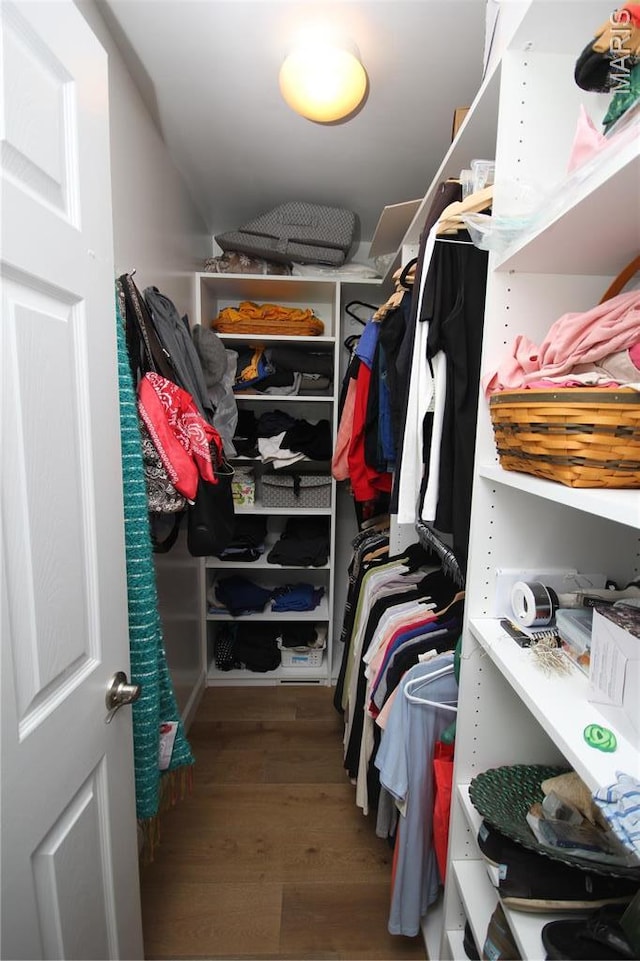 1209 Hunters Chase Dr, Eureka, MO 63025 - walk in closet featuring wood finished floors