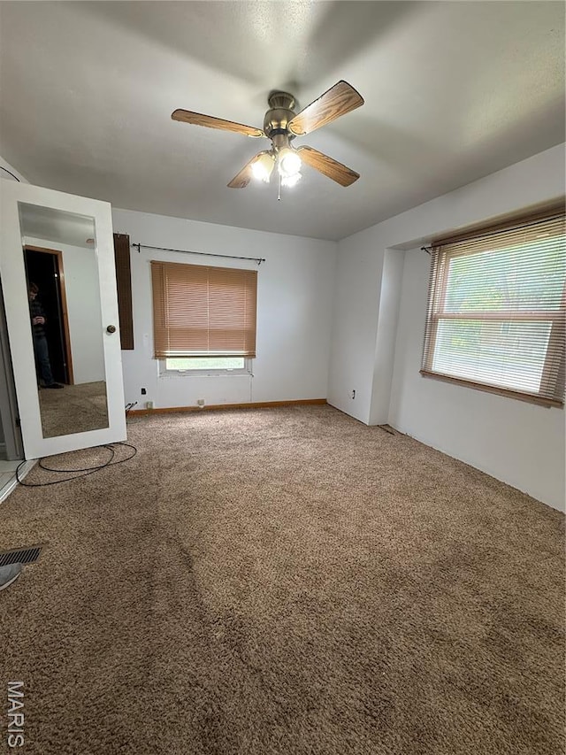 226 Dixie St, Sikeston, MO 63801 - empty room featuring a ceiling fan and carpet flooring