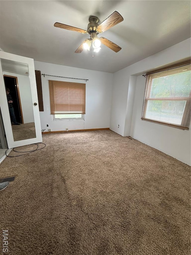 226 Dixie St, Sikeston, MO 63801 - unfurnished room with ceiling fan and carpet