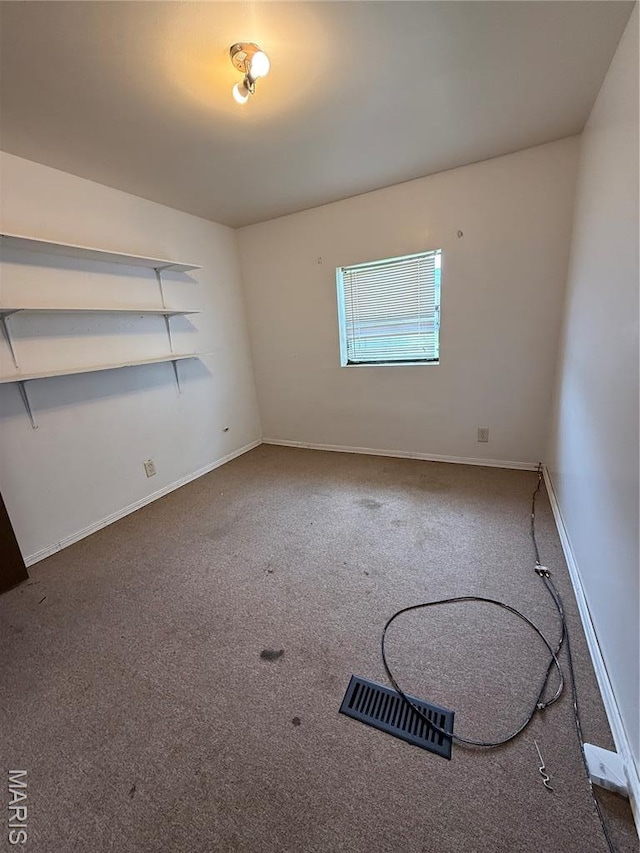 226 Dixie St, Sikeston, MO 63801 - unfurnished room with carpet flooring and baseboards