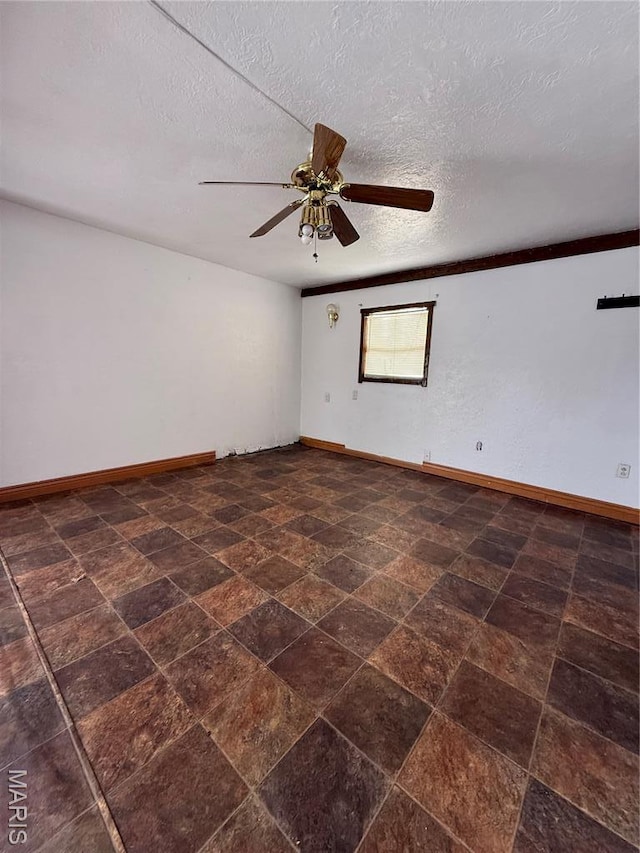 226 Dixie St, Sikeston, MO 63801 - empty room featuring baseboards, ceiling fan, and a textured ceiling