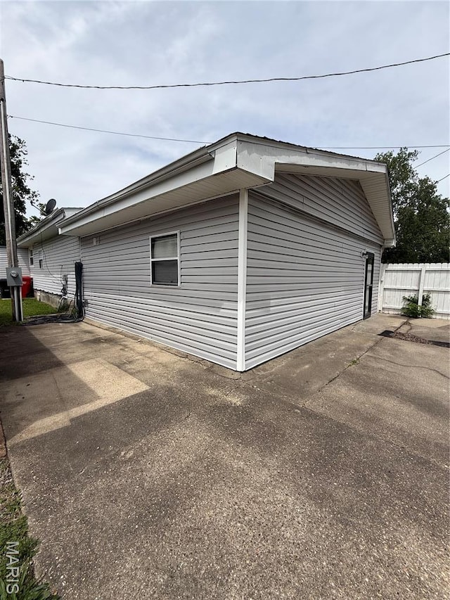 226 Dixie St, Sikeston, MO 63801 - view of property exterior with fence