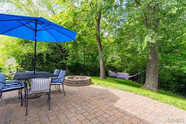 1438 Arbor Green Trl, Ofallon, IL 62269 - view of patio / terrace with a fire pit and outdoor dining area