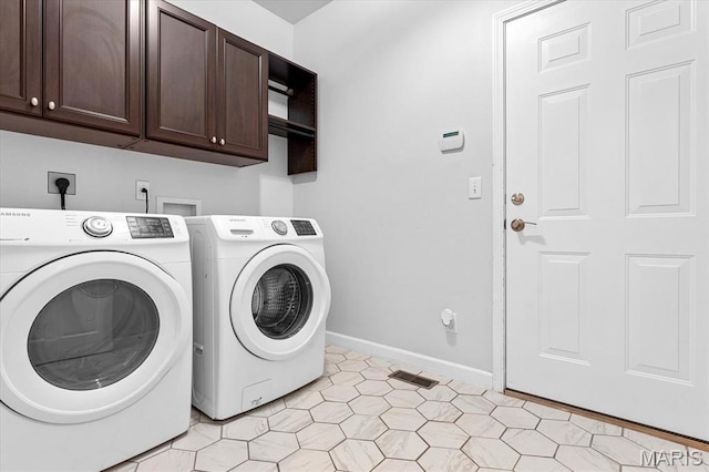 1438 Arbor Green Trl, Ofallon, IL 62269 - washroom with cabinet space, separate washer and dryer, and baseboards