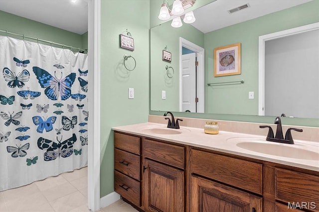 1438 Arbor Green Trl, Ofallon, IL 62269 - bathroom with double vanity, tile patterned flooring, and curtained shower