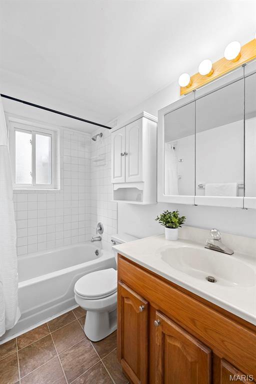 1811 Gascony Parc Dr Unit 1811, Lake St Louis, MO 63367 - full bathroom with vanity, shower / tub combo, toilet, and tile patterned floors