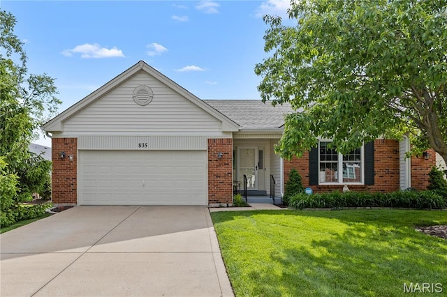 ranch-style home featuring brick siding, a front yard, concrete driveway, and an attached garage