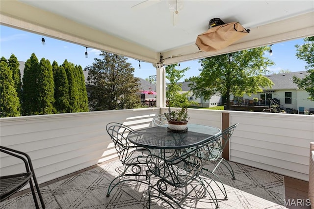 deck with outdoor dining space