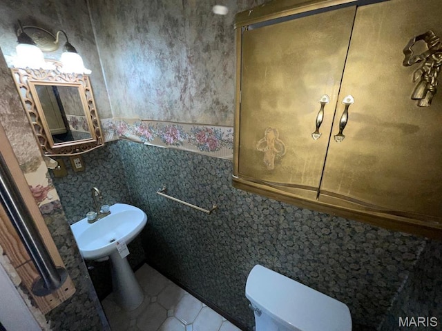 33 Briarcliff Dr, Granite City, IL 62040 - bathroom with tile patterned floors, toilet, and a sink
