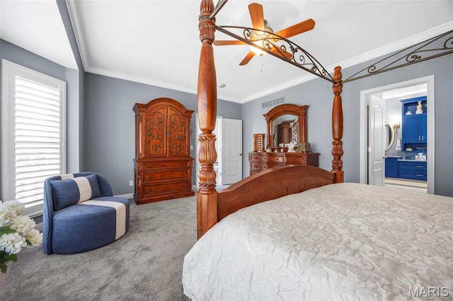 bedroom featuring carpet, crown molding, a ceiling fan, and ensuite bath