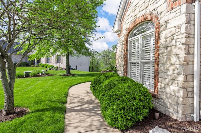 surrounding community with a lawn