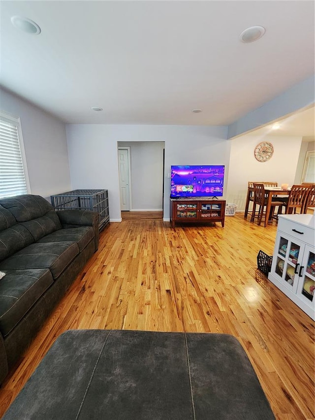 1104 Ringo St, Mexico, MO 65265 - living room with wood finished floors and baseboards
