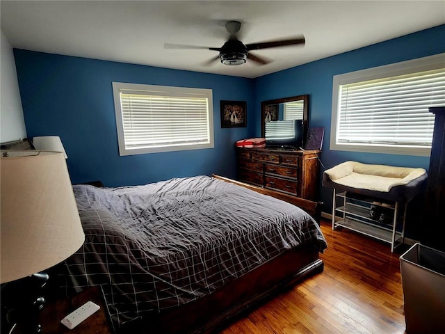 1104 Ringo St, Mexico, MO 65265 - bedroom featuring wood finished floors and a ceiling fan