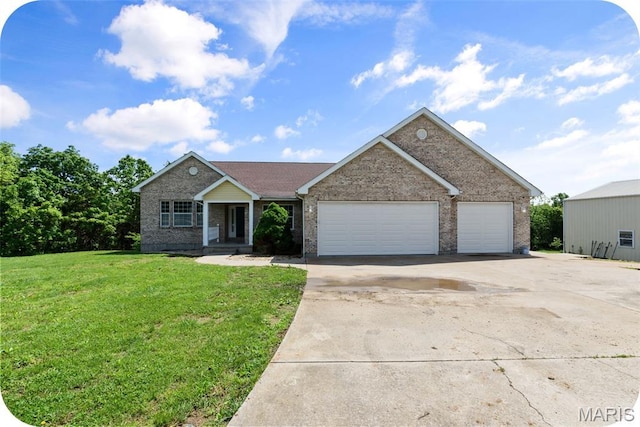 122 Morgan Lake Rd, De Soto, MO 63020 - ranch-style home featuring concrete driveway, brick siding, an attached garage, and a front yard