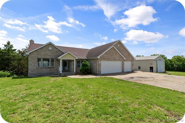 122 Morgan Lake Rd, De Soto, MO 63020 - ranch-style home with an attached garage, driveway, brick siding, and a front yard