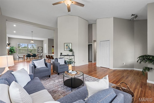 122 Morgan Lake Rd, De Soto, MO 63020 - living room with ceiling fan, wood finished floors, recessed lighting, and baseboards