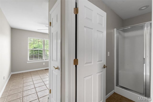 122 Morgan Lake Rd, De Soto, MO 63020 - full bathroom featuring a shower stall, tile patterned floors, and baseboards