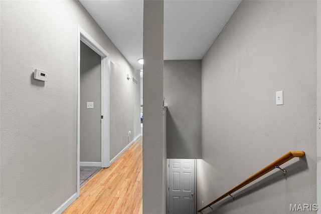 122 Morgan Lake Rd, De Soto, MO 63020 - staircase with wood finished floors and baseboards