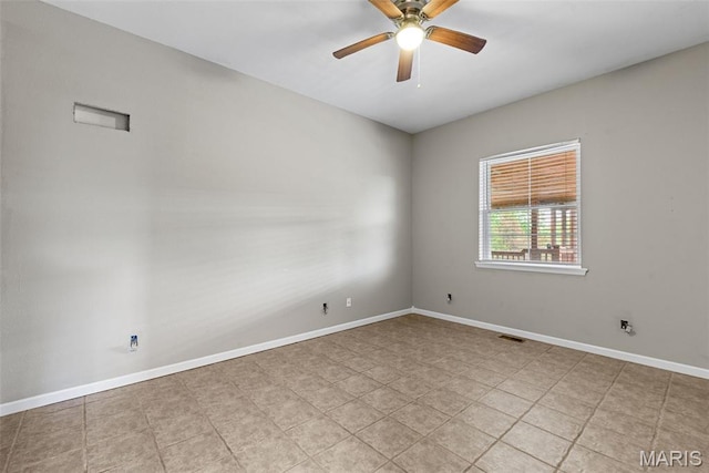 122 Morgan Lake Rd, De Soto, MO 63020 - unfurnished room with a ceiling fan and baseboards