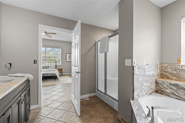 122 Morgan Lake Rd, De Soto, MO 63020 - bathroom with connected bathroom, a stall shower, vanity, a garden tub, and tile patterned flooring