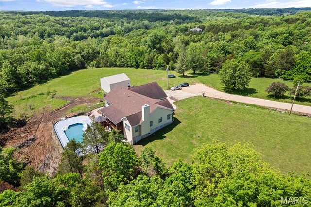 122 Morgan Lake Rd, De Soto, MO 63020 - view of subject property featuring a heavily wooded area