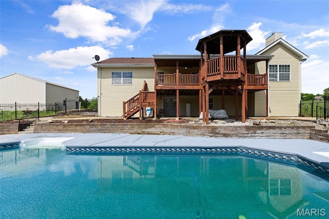 122 Morgan Lake Rd, De Soto, MO 63020 - view of swimming pool with stairs and a wooden deck