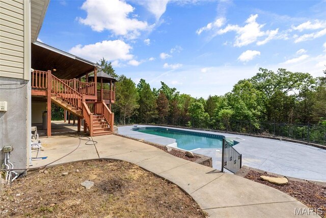 122 Morgan Lake Rd, De Soto, MO 63020 - view of swimming pool with stairway, a patio, and a deck