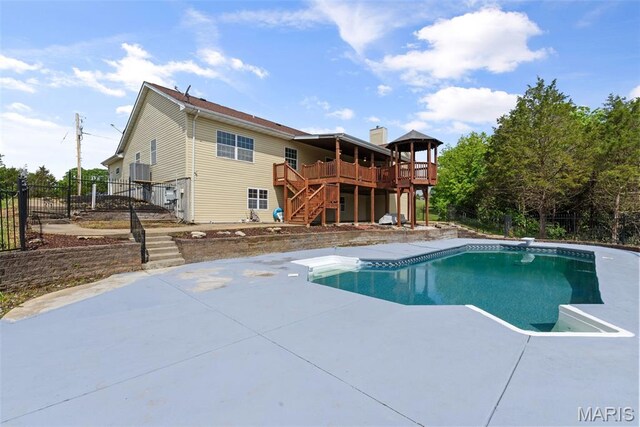 122 Morgan Lake Rd, De Soto, MO 63020 - view of swimming pool with stairway, a deck, a patio area, and a diving board