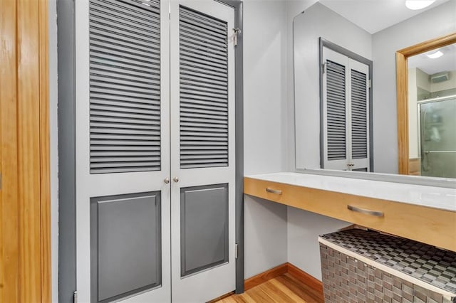detailed view of wood finished floors and baseboards