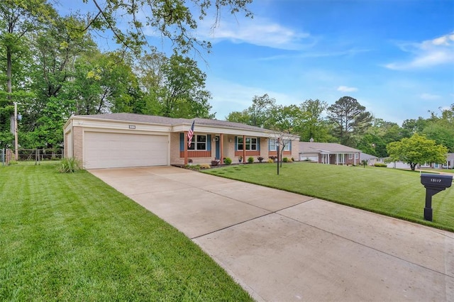ranch-style home featuring concrete driveway, a garage, brick siding, and covered porch