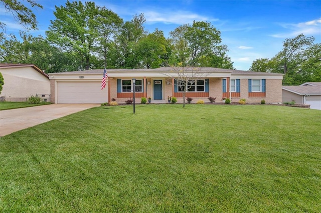 ranch-style house featuring an attached garage, concrete driveway, a front lawn, and brick siding