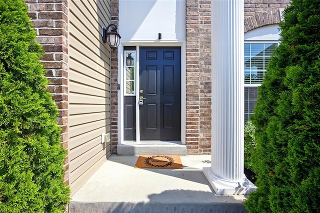 491 Cypress Creek Ln, Imperial, MO 63052 - doorway to property with brick siding