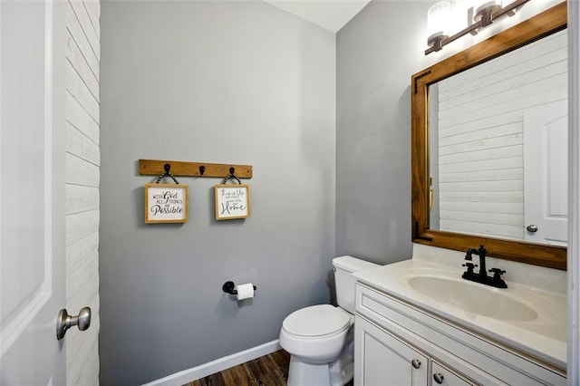 491 Cypress Creek Ln, Imperial, MO 63052 - bathroom with vanity, baseboards, toilet, and wood finished floors