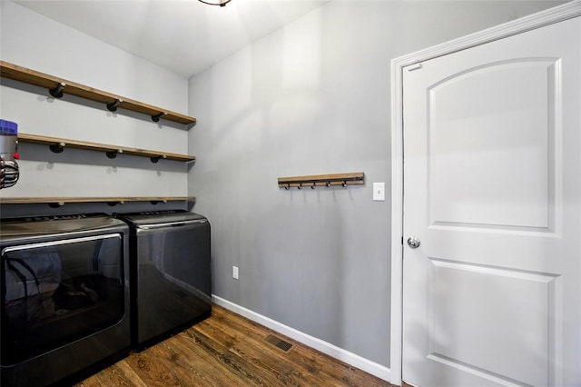 491 Cypress Creek Ln, Imperial, MO 63052 - washroom with washing machine and clothes dryer, dark wood-type flooring, and baseboards