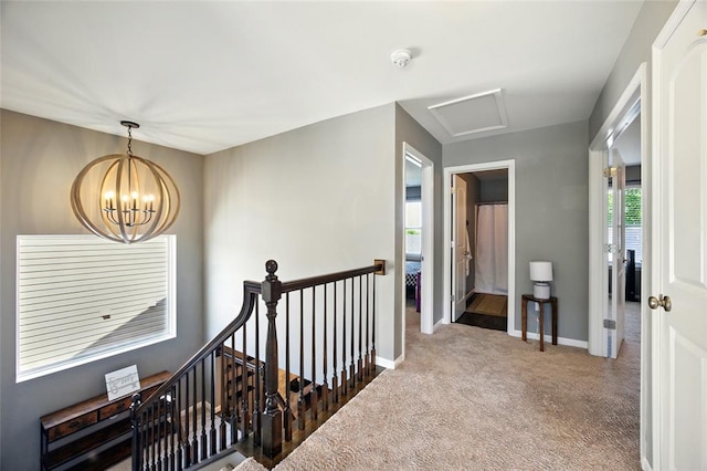 491 Cypress Creek Ln, Imperial, MO 63052 - hallway with an upstairs landing, carpet floors, a chandelier, and baseboards