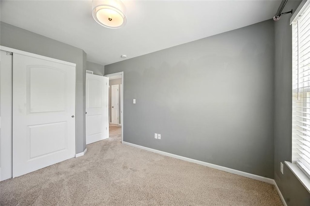 491 Cypress Creek Ln, Imperial, MO 63052 - unfurnished bedroom with carpet flooring, baseboards, and a closet