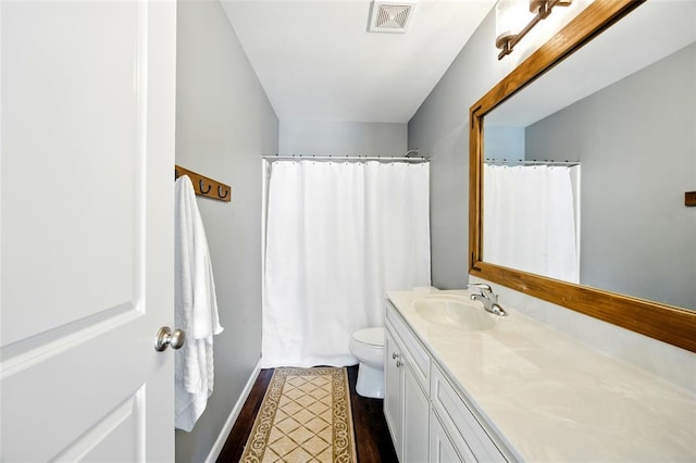 491 Cypress Creek Ln, Imperial, MO 63052 - bathroom with vanity, toilet, wood finished floors, and a shower with curtain