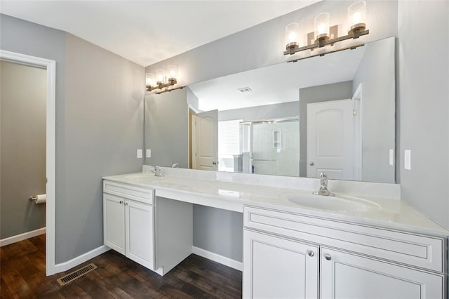 491 Cypress Creek Ln, Imperial, MO 63052 - full bathroom featuring a shower stall, wood finished floors, double vanity, and baseboards