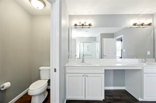 491 Cypress Creek Ln, Imperial, MO 63052 - bathroom with double vanity, a stall shower, toilet, and wood finished floors