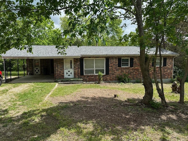 16864 State Highway 32, Bismarck, MO 63624 - single story home with dirt driveway, an attached carport, brick siding, and a front yard