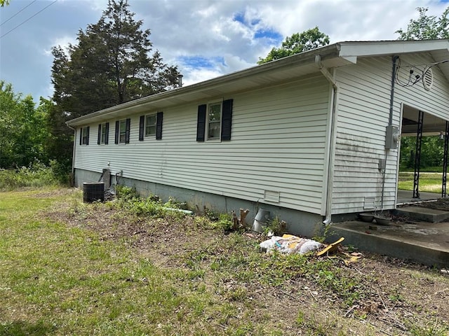16864 State Highway 32, Bismarck, MO 63624 - view of side of home featuring central AC