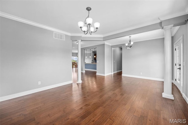 137 Countryshire Dr, Lake St Louis, MO 63367 - unfurnished living room with decorative columns, a chandelier, ornamental molding, baseboards, and wood finished floors